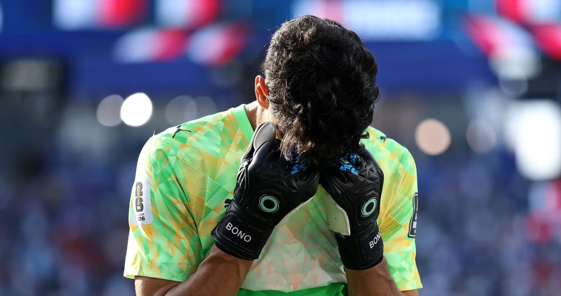 Goalkeeper with head down in distress during match
