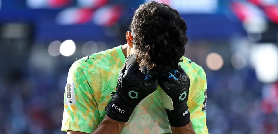 Goalkeeper with head down in distress during match