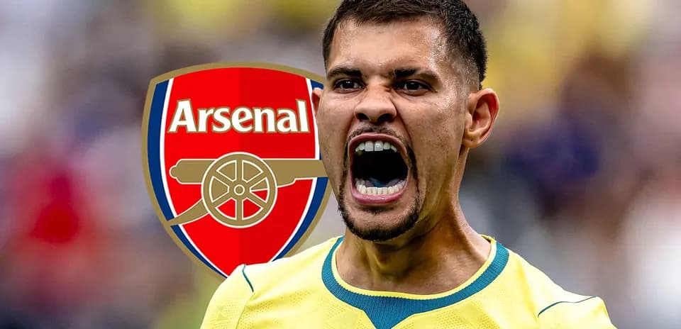 Player celebrating with Arsenal logo in background