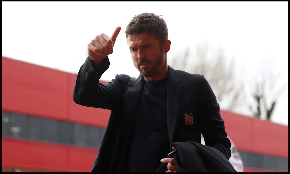 Man giving a thumbs up outside stadium