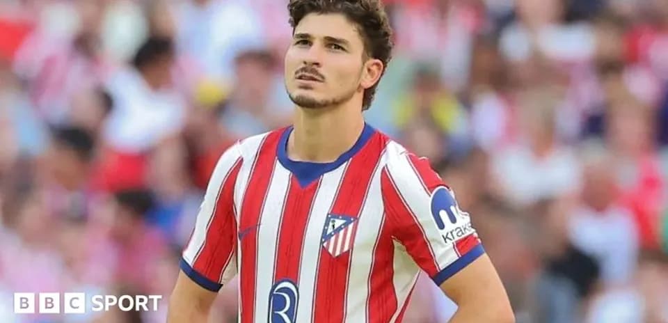 Atletico Madrid player looking on during match