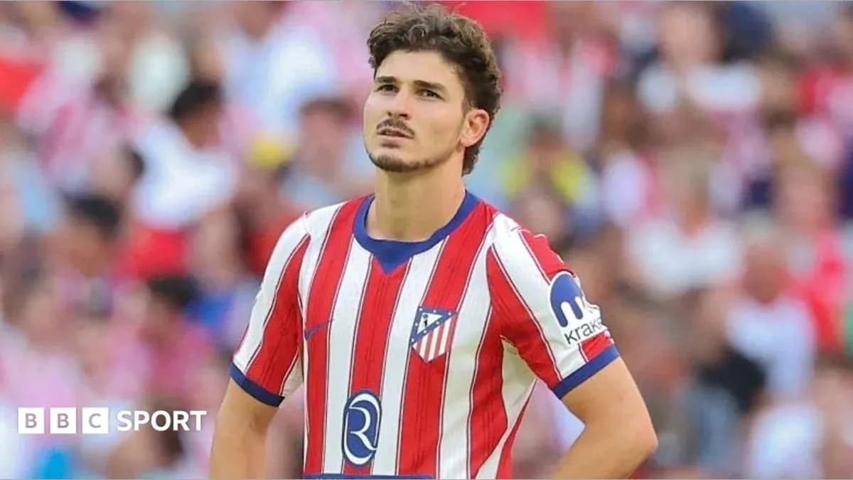 Atletico Madrid player looking on during match
