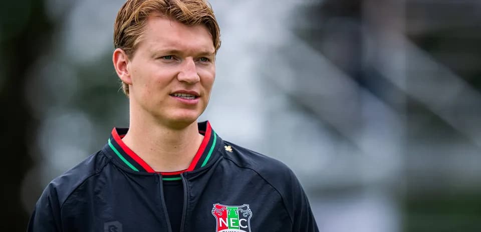 Player in NEC Nijmegen training gear outdoors