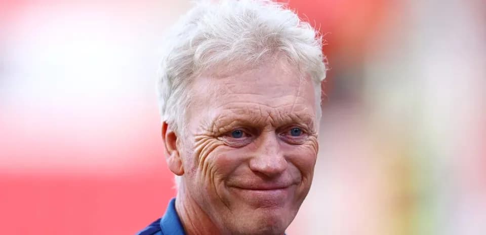 Manager smiling during pre-match event