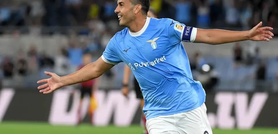 Lazio player celebrating a goal on the field