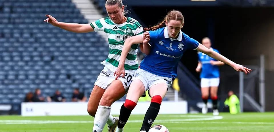 Celtic and Rangers players contesting the ball