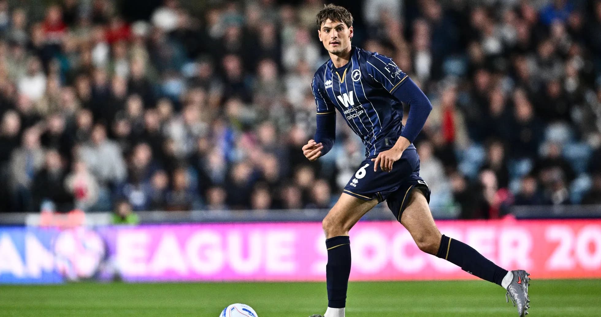 Player dribbling the ball during a match
