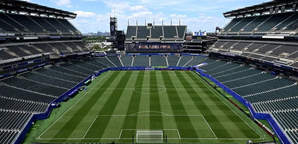 Empty stadium with soccer field and seating