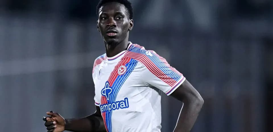 Player in white jersey during match action