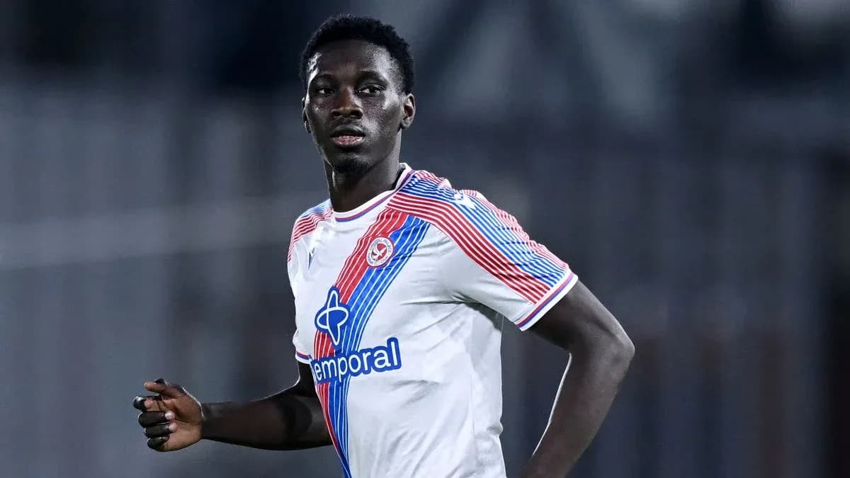 Player in white jersey during match action