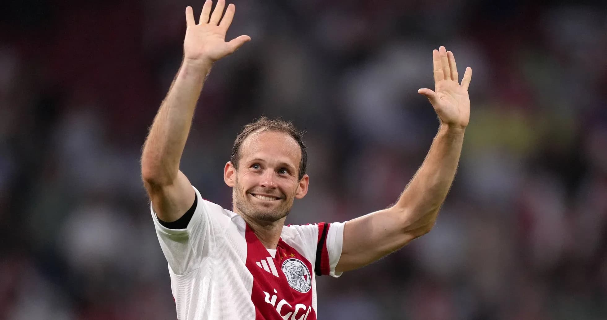 Player waving to fans after the match