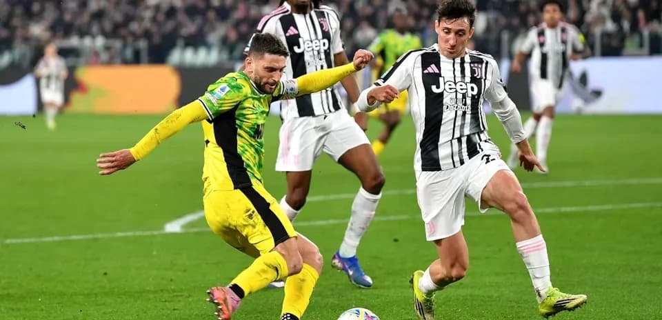 Players competing for the ball during match action