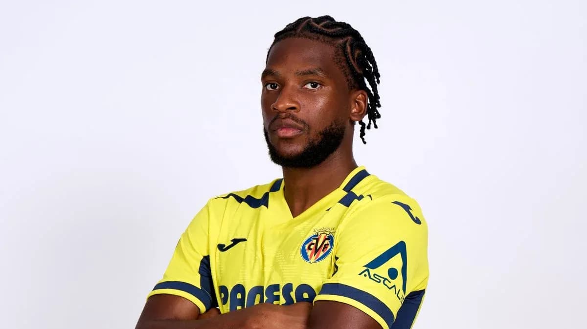 Player posing in yellow Villarreal jersey Player posing in yellow Villarreal jersey