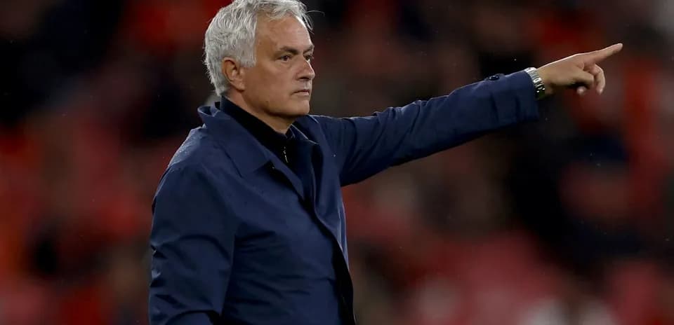 Manager gesturing during match from the sideline