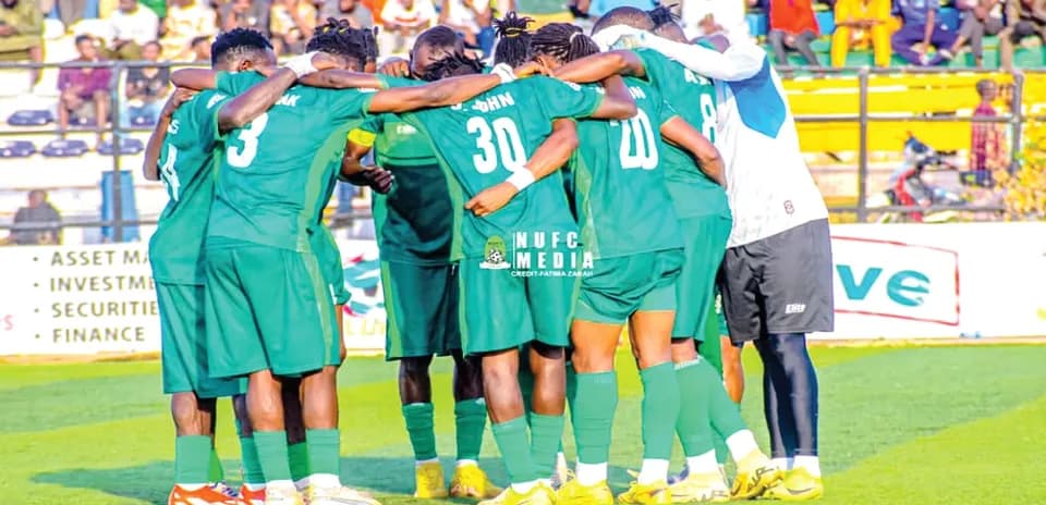Nasarawa United players huddling before the match
