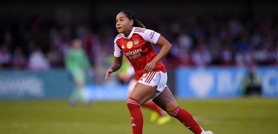 Player running during women's football match
