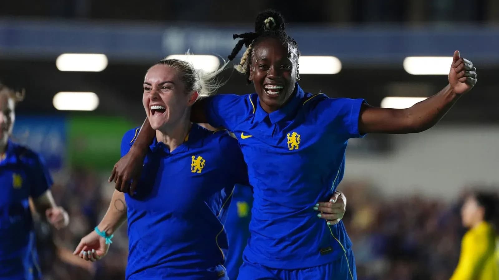 Chelsea W players celebrating a goal