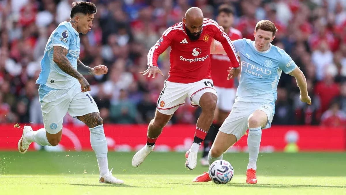 Three players competing for the ball during match