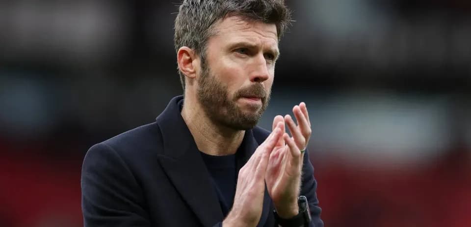 Coach applauding after a match on the field