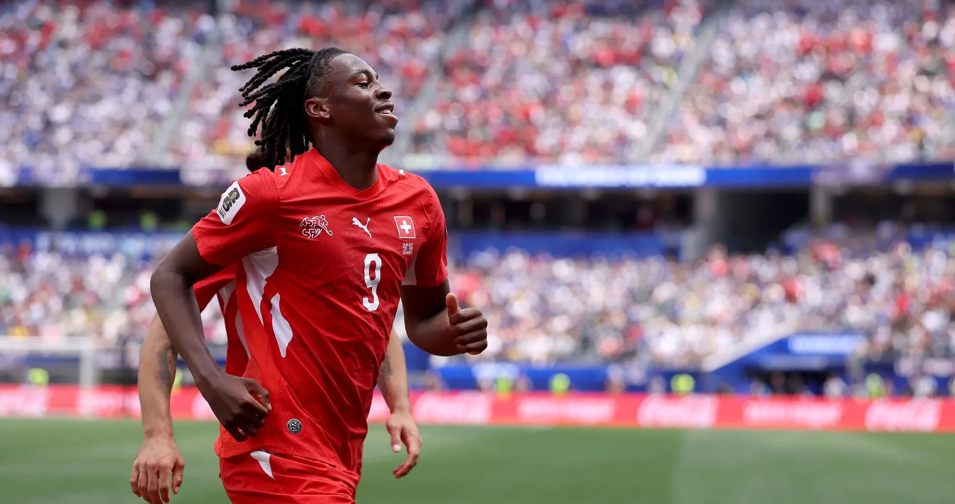 Player celebrating on the field during a match