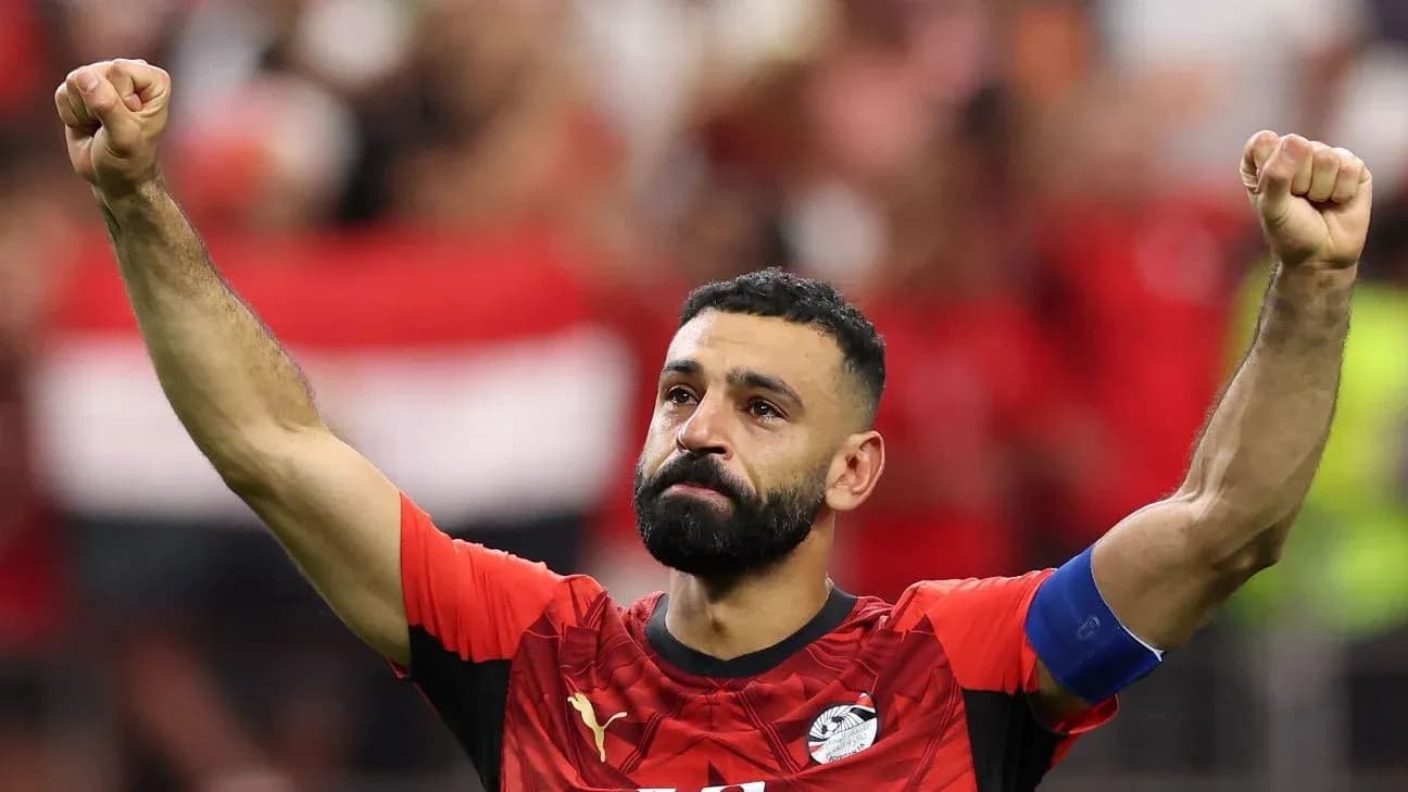 Player celebrating with raised fist in stadium