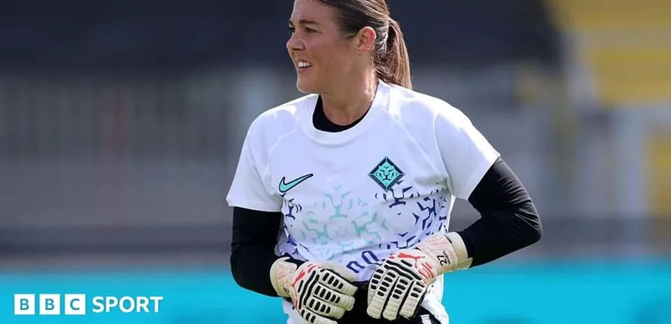 Goalkeeper in training gear preparing for practice
