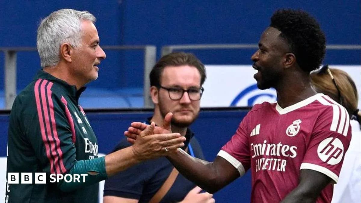 Coach and player shaking hands during match