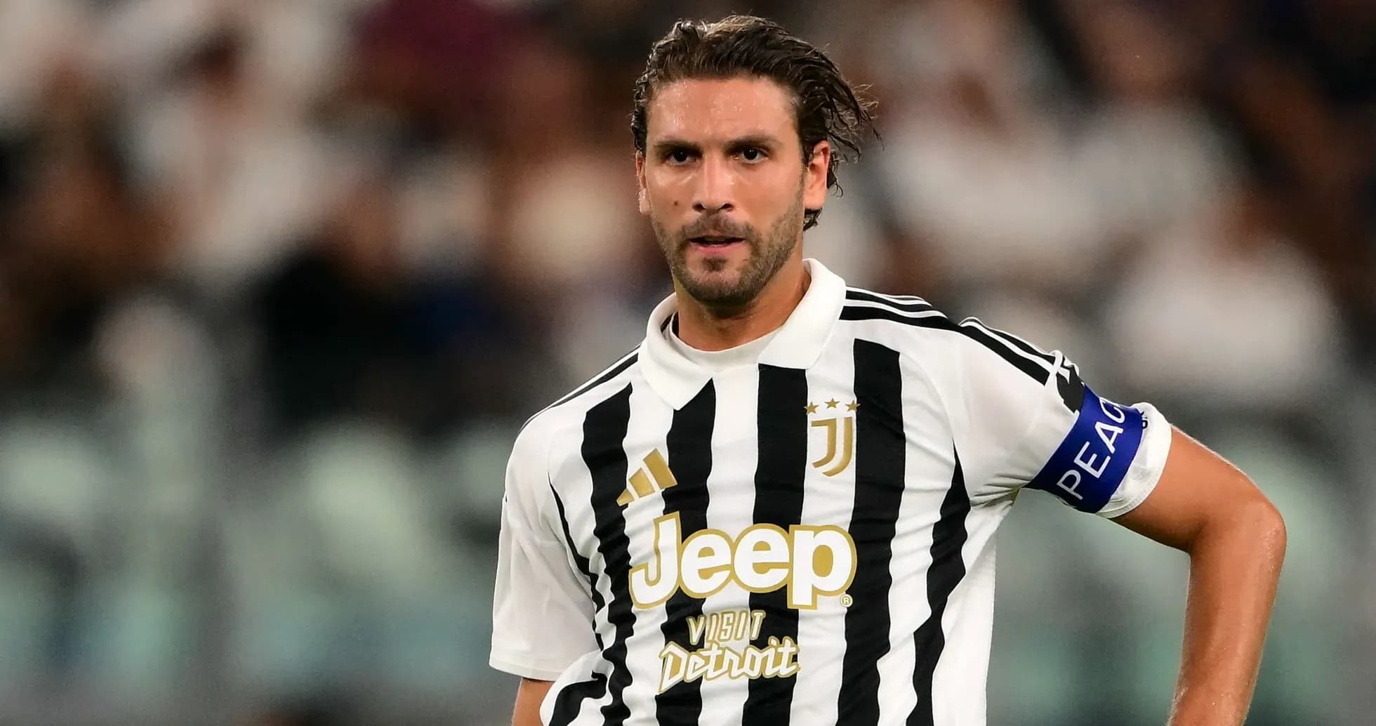 Juventus player during a match wearing captain's armband