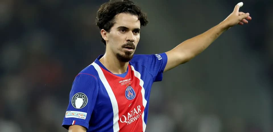 Player gesturing during match in PSG uniform