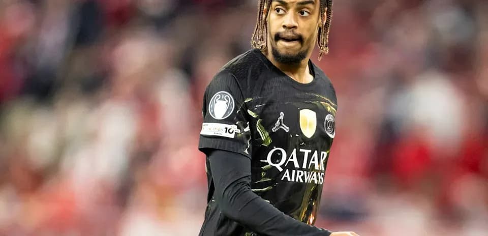 Player wearing PSG jersey on the pitch