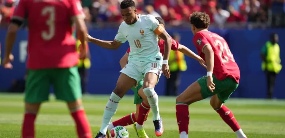 Player in white evading two defenders in match