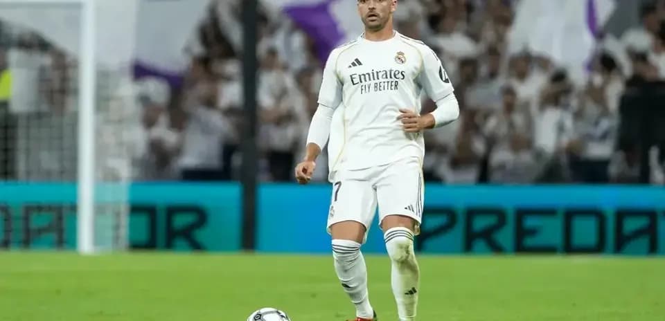 Player preparing to take a free kick during match