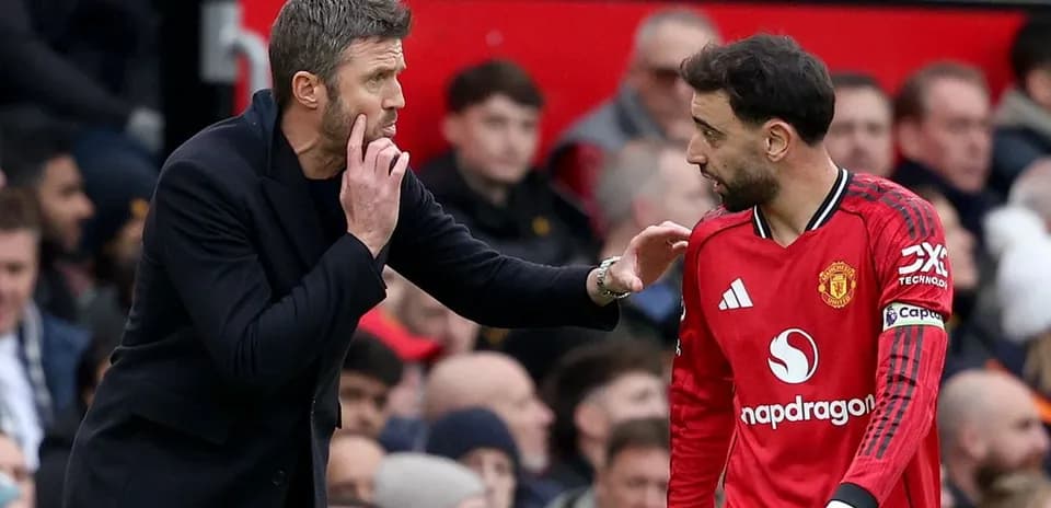Manager giving instructions to player during match