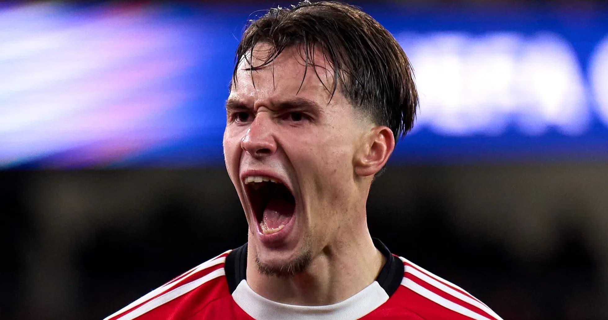 Player celebrating passionately after a goal