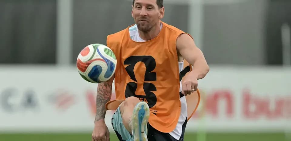 Player juggling soccer ball during training session