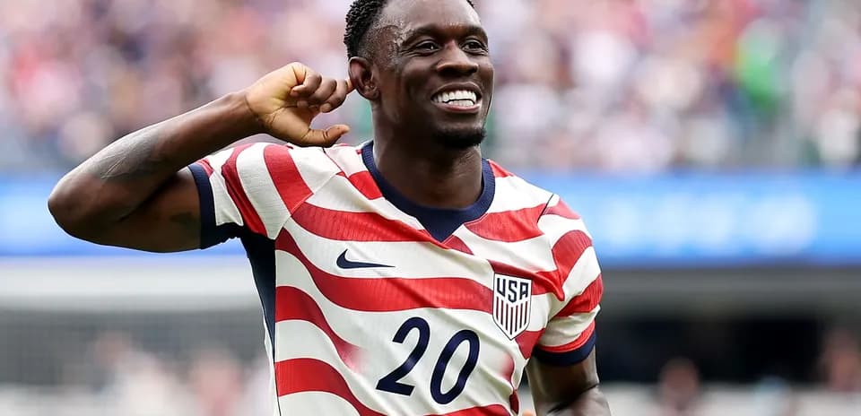 Player celebrating in USA team jersey during match