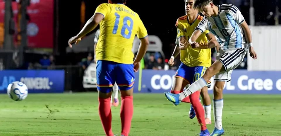Argentinian player striking the ball during match
