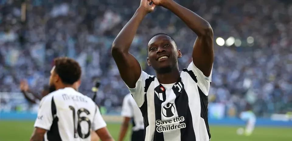 Player celebrating with fans after the match