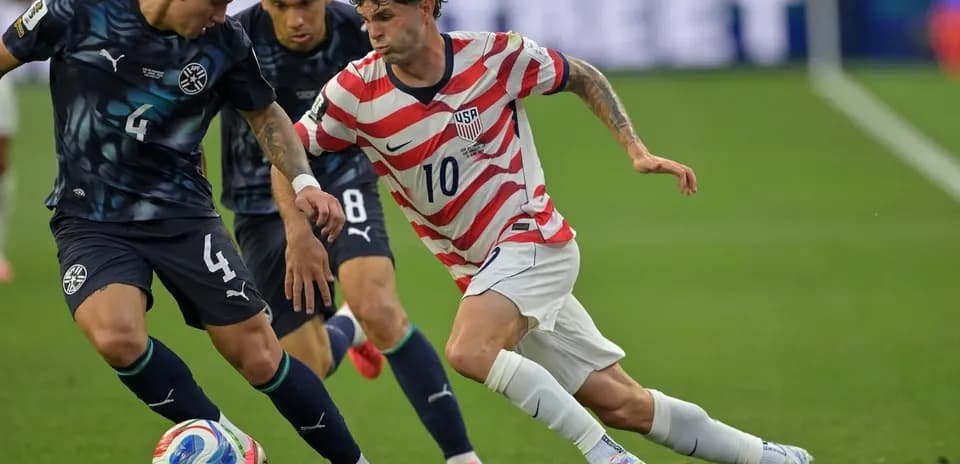 Players competing for the ball during a match