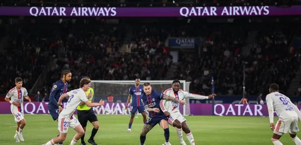 Players competing for the ball during a match