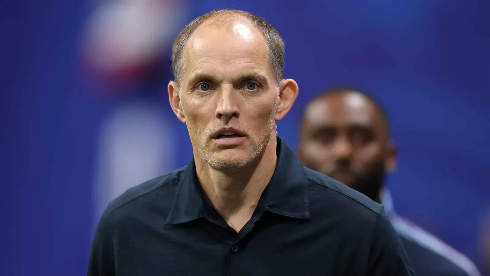 Coach looking serious before the match