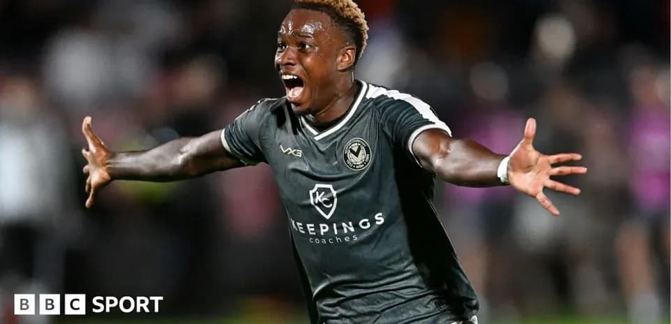 Player celebrating a goal on the field