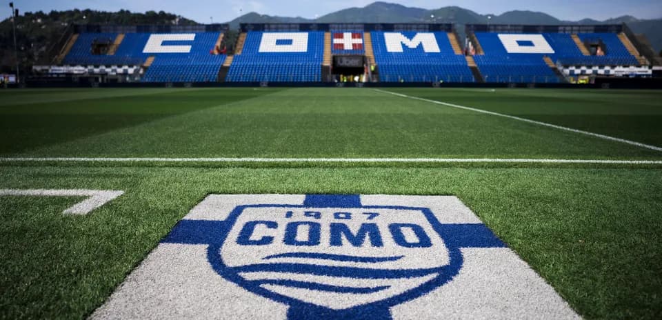 Como stadium with logo and empty seating area