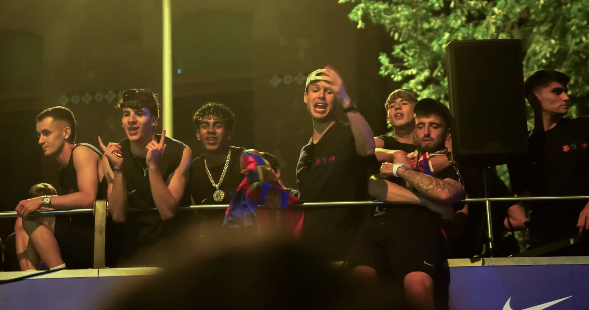 Group of fans celebrating at an event