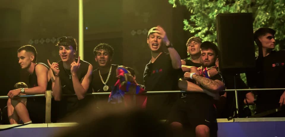 Group of fans celebrating at an event