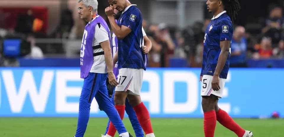 Player assisted off the field during a match
