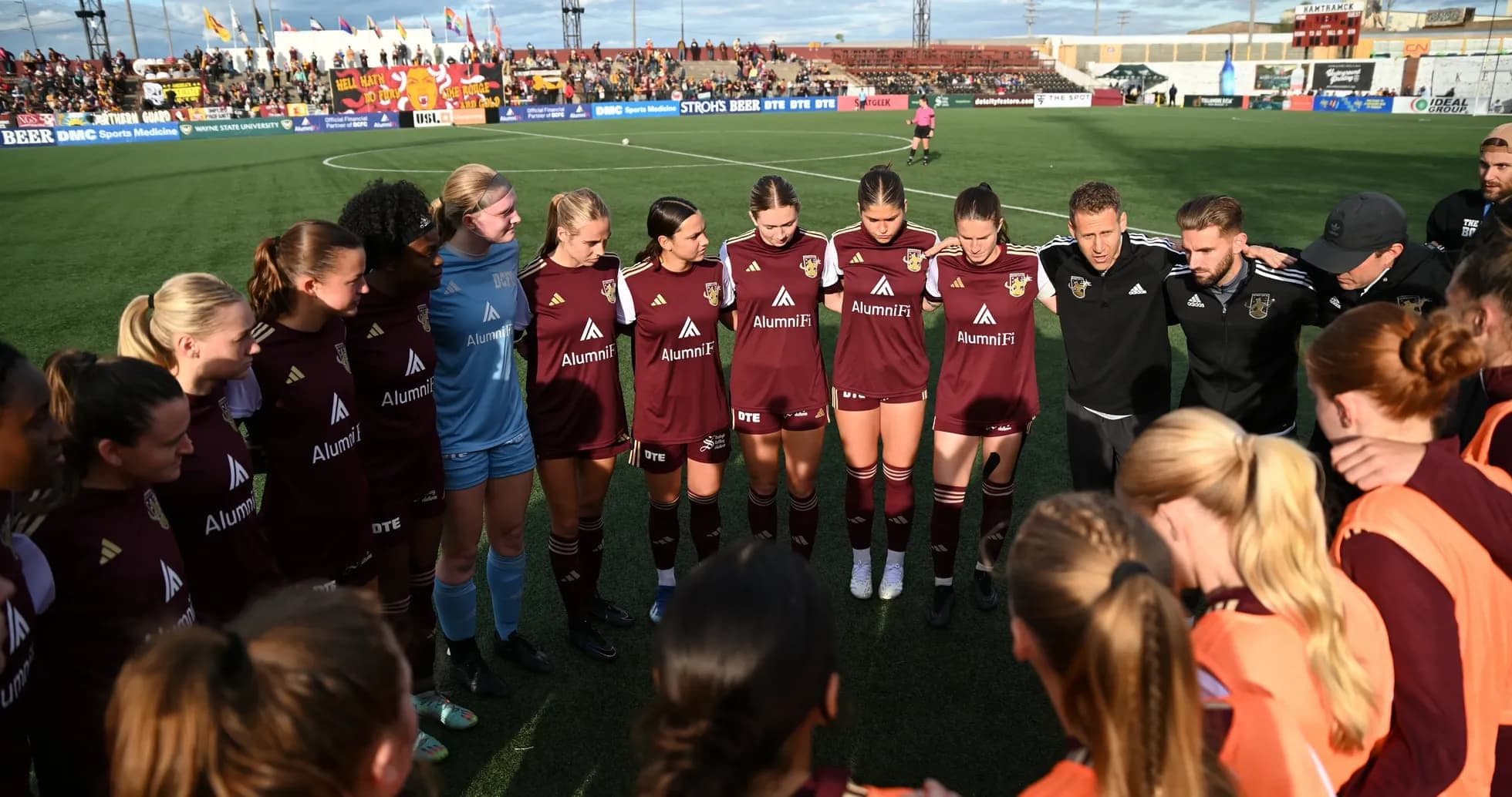 Detroit City players huddled before match