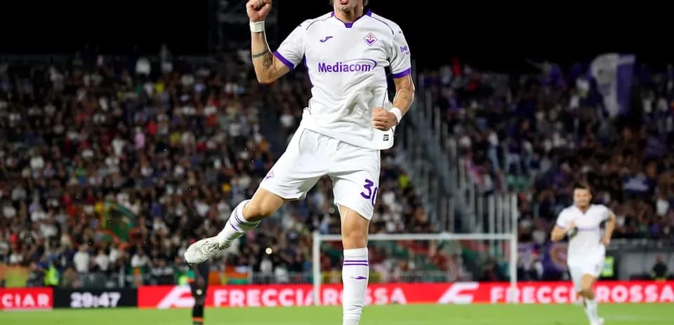 Fiorentina player celebrating a goal in match