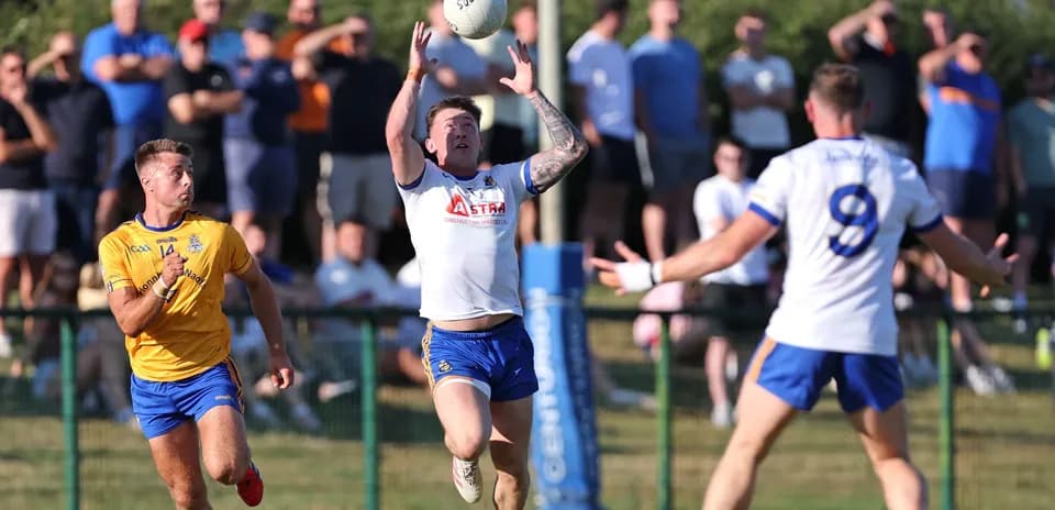 Player catching ball during a rugby match
