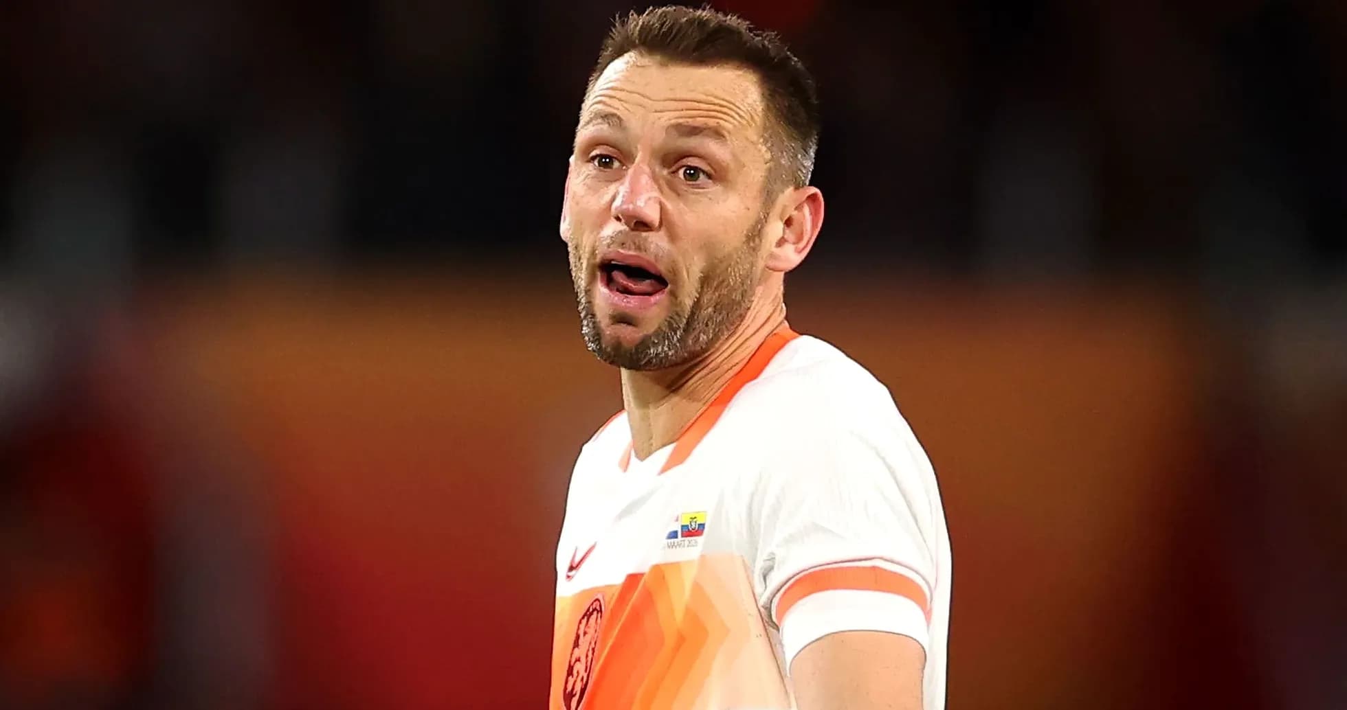 Player in orange jersey during a match